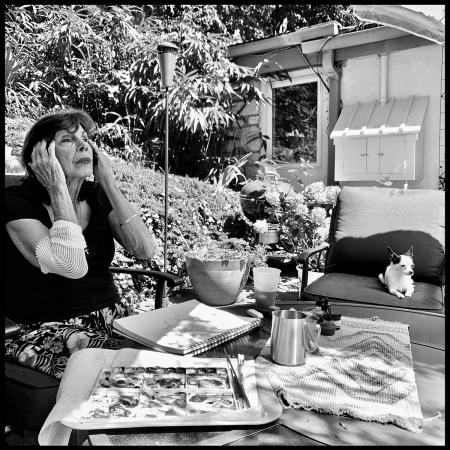 Joan and Eduardo paint on the patio
